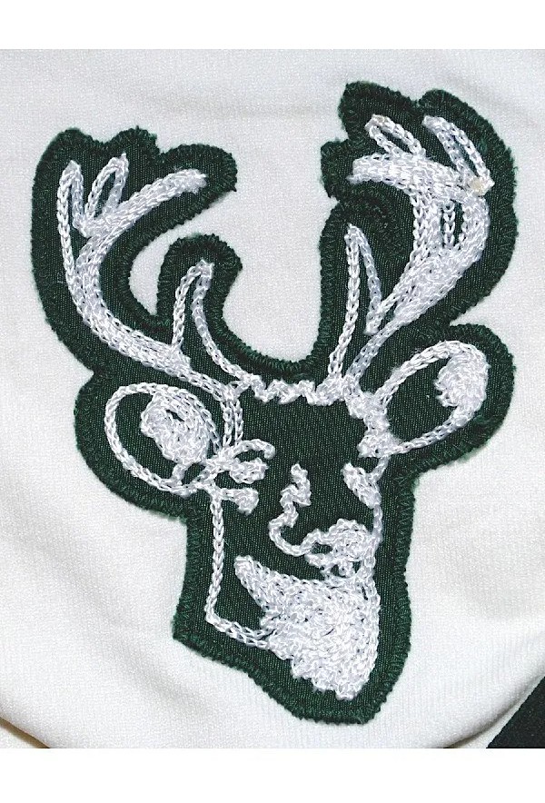 Milwaukee Bucks on X: The uniform features the 1971 home wordmark
